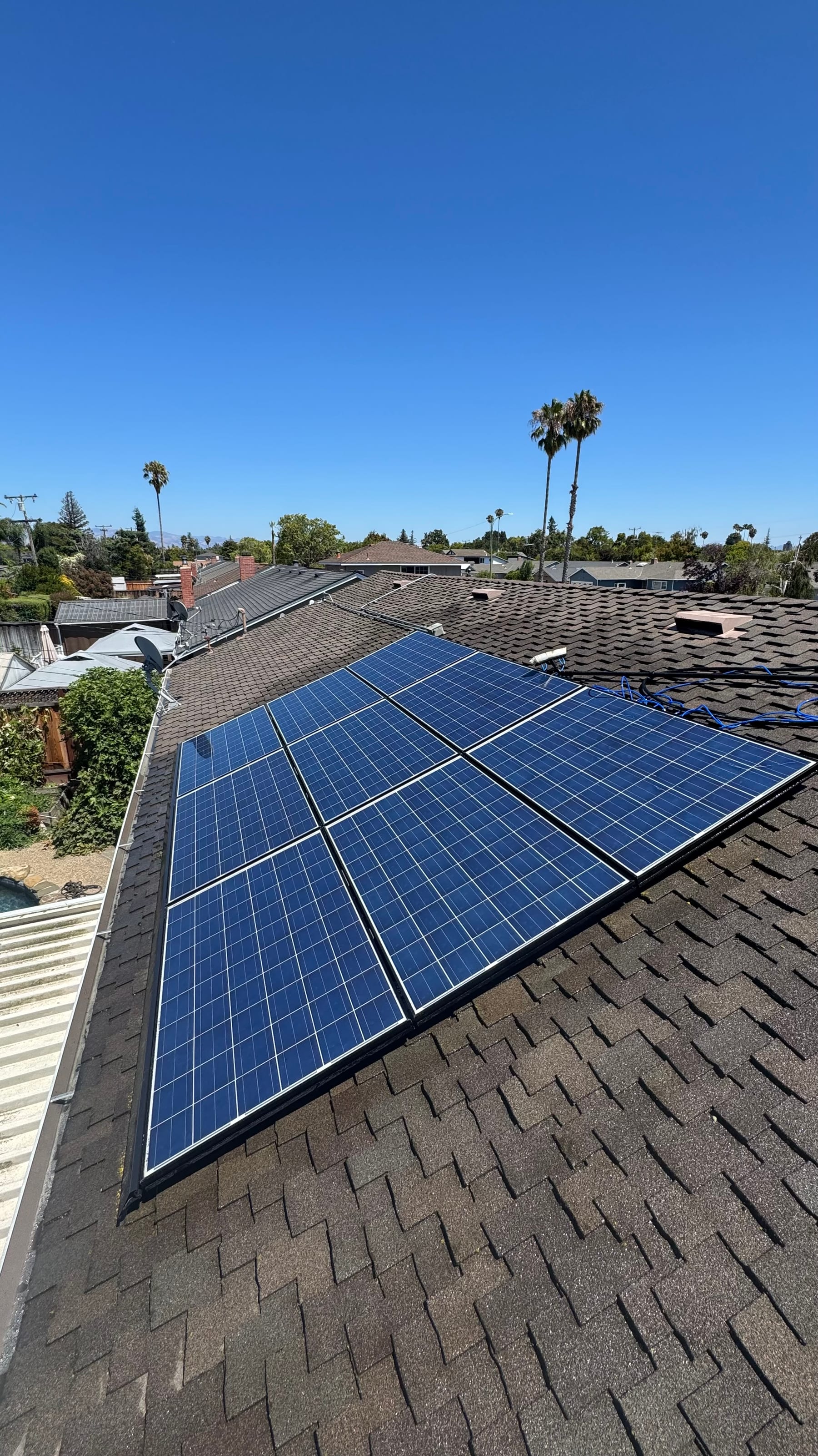The same rooftop solar panels after cleaning by Bright Blast Teens